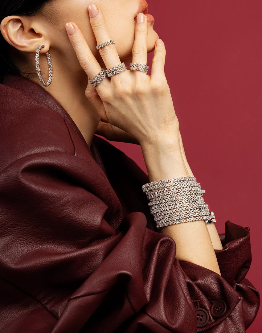 APM Monaco Couture jewelry styled with a deep burgundy fashion look